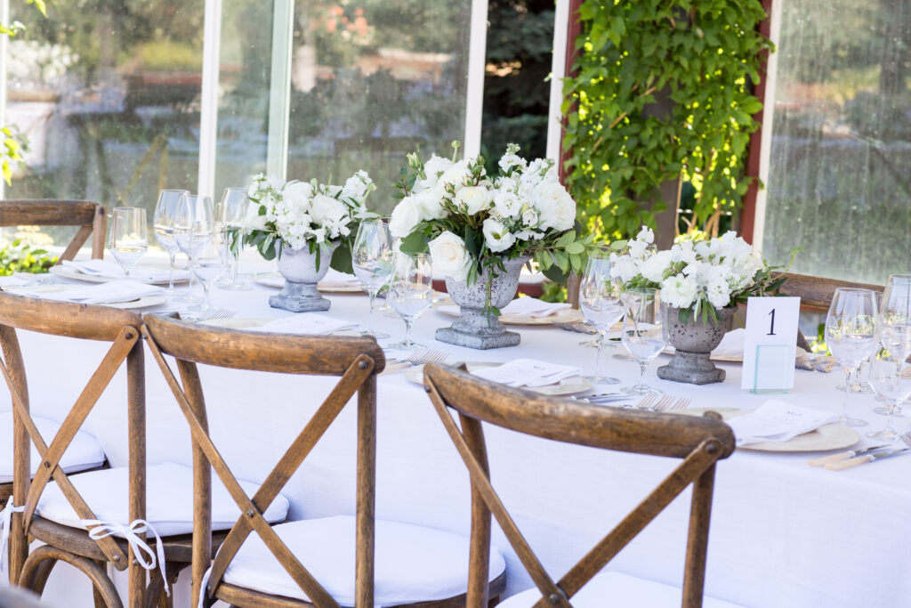 gorgeous walnut wood chiavari chairs completed the guest tables at this wine country outdoor wedding