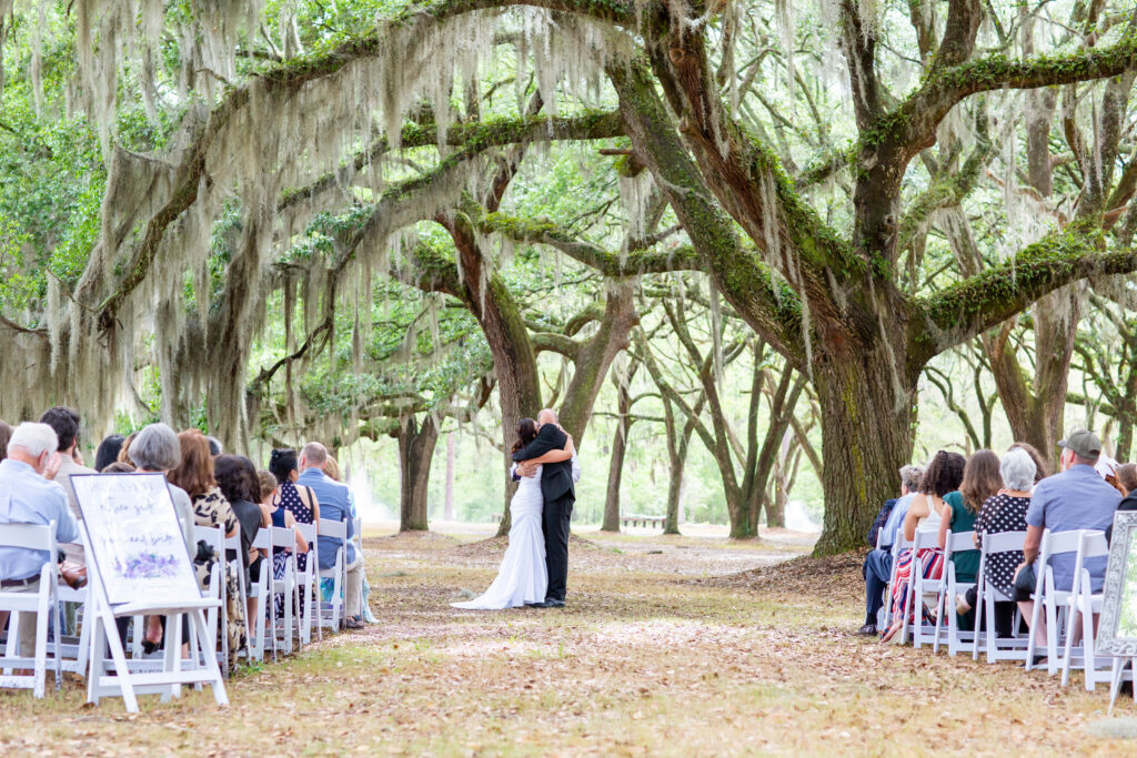 you may kiss the bride under the oaks with spanish moss