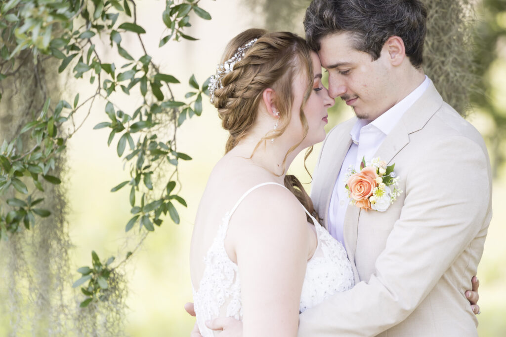 bride and groom moment under a southern oak at Twelve Oak Estate in Lexington SC
