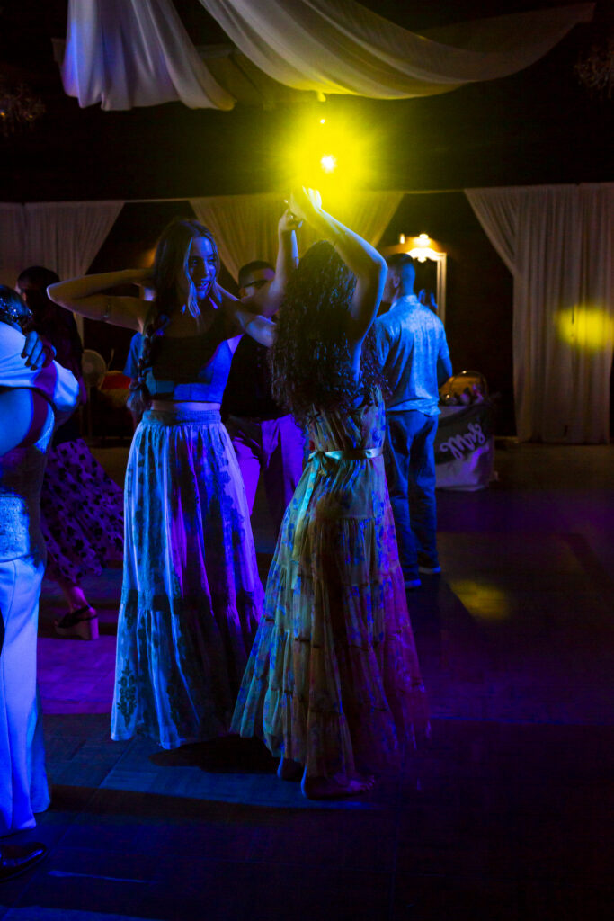 wedding guests dance in the converted airplane hangar at the Twelve Oak Estate in Lexington SC